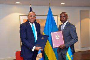Minister of Foreign Affairs, Kerrie Symmonds (left) and Rwandan Minister of Infrastructure Dr. Ernest Nsabimana signed a bilateral Air Services Agreement in Kigali.